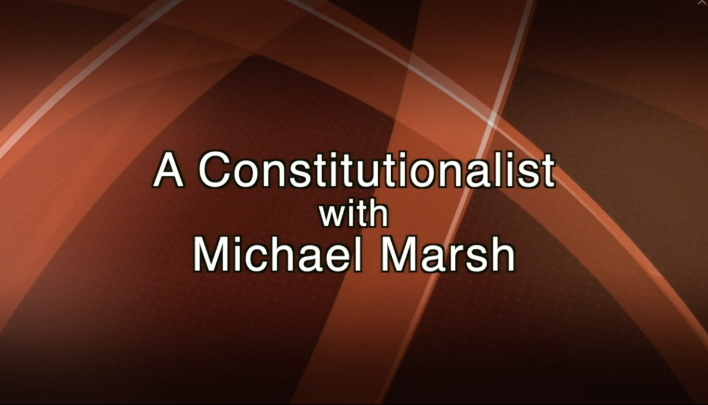 abstract red background with white words in the middle: A Constitutionalist with Michael Marsh
