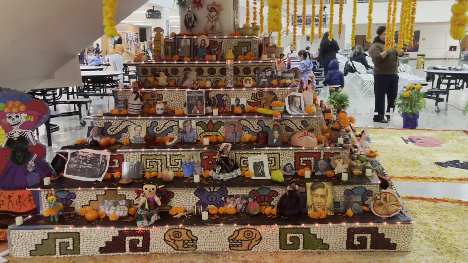 Day of the Dead altar with pictures other memorabilia 